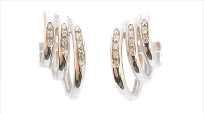 Lot 44 - A pair of 18ct gold diamond earrings