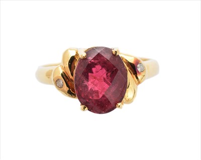 Lot 215 - An 18ct gold tourmaline and diamond dress ring