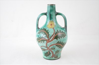 Lot 149 - Della Robbia twin handled vase