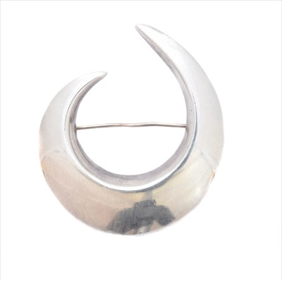 Lot 53 - A Georg Jensen silver crescent brooch