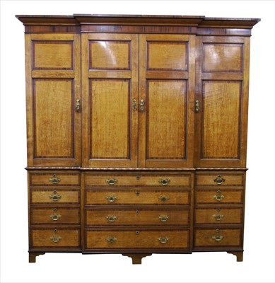 Lot 317 - Early 19th century oak and mahogany veneered breakfront housekeepers cupboard