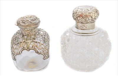 Lot 73 - Two Victorian silver lidded jars