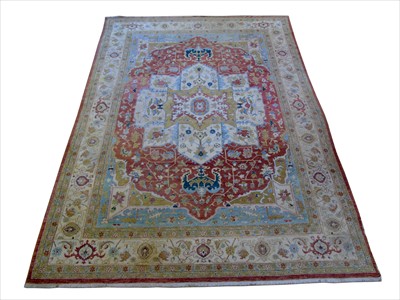 Lot 334 - 20th century Indian carpet.