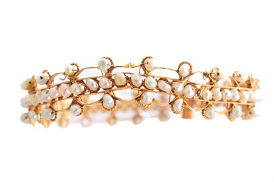 Lot 24 - A seed pearl bangle