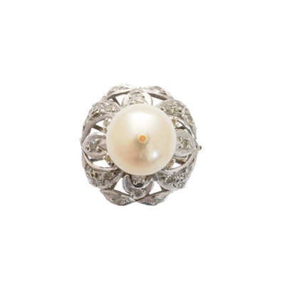 Lot 128 - A natural saltwater pearl and diamond cluster ring