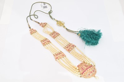 Lot 94 - A natural pearl and ruby necklace
