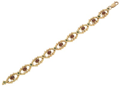 Lot 9 - A 9ct gold garnet and emerald bracelet