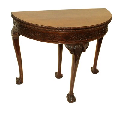 Lot 198 - Edwardian mahogany fold over card table