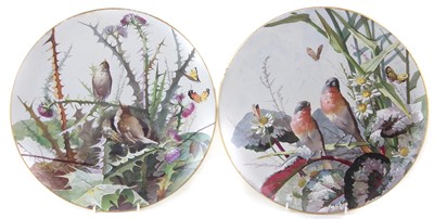 Lot 90 - Pair of Montereau chargers painted with bird studies.