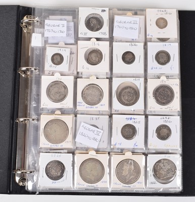 Lot 74 - One album of historical mainly silver British coinage dating from George II through to George VI.