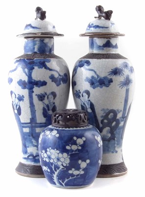Lot 77 - Chinese ginger jar with pierced wood lid, also a pair of lidded vases with crackle glaze.