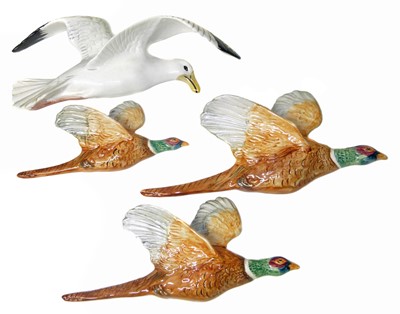 Lot 89 - Beswick three piece Pheasant wall plaque set.