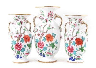 Lot 88 - Garniture of three English porcelain vases