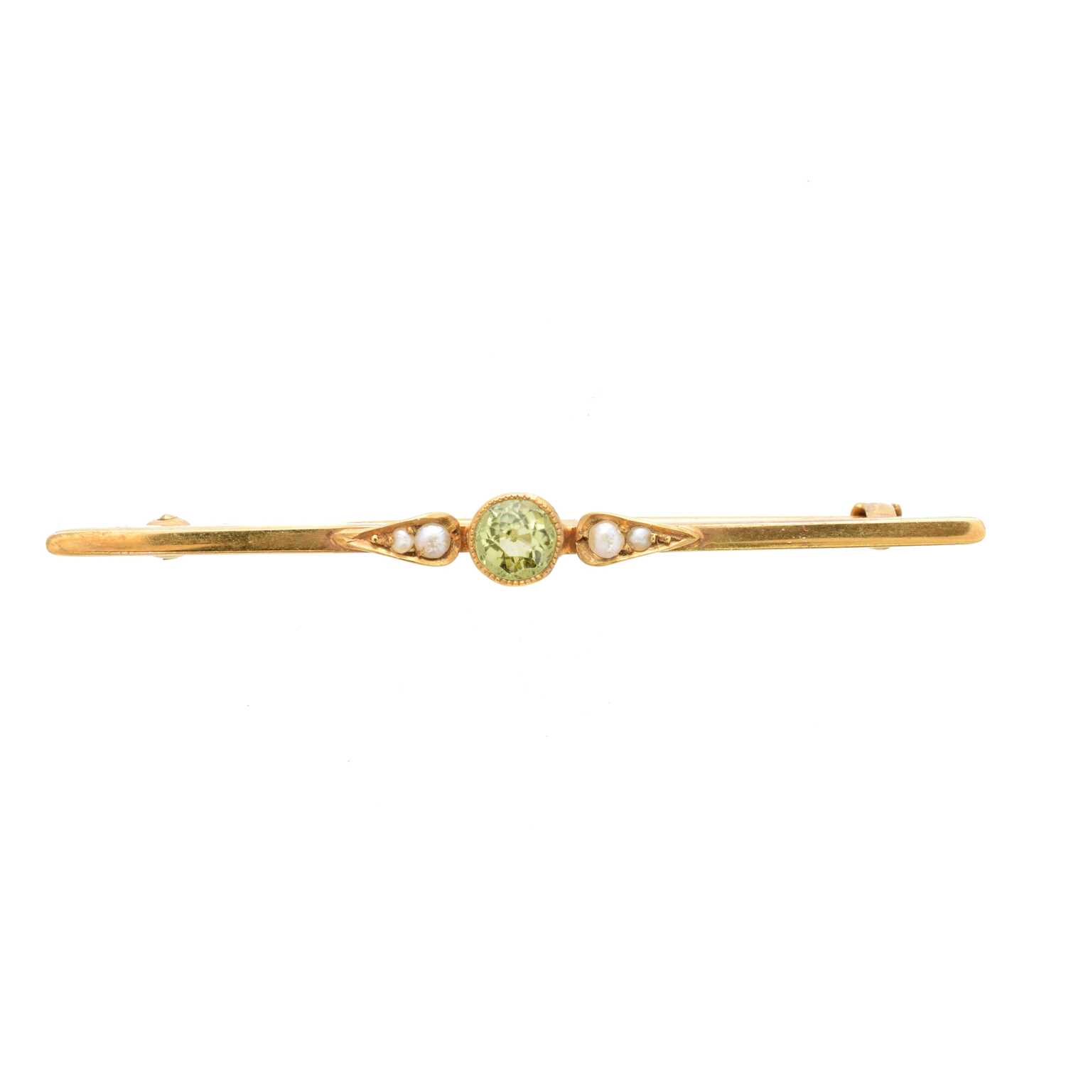 Lot 28 - An early 20th century peridot and split pearl brooch by Murrle Bennett & Co.