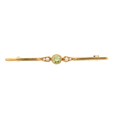 Lot 28 - An early 20th century peridot and split pearl brooch by Murrle Bennett & Co.
