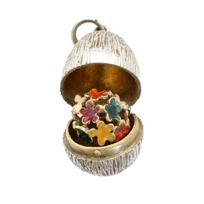 Lot 62 - A silver and enamel egg pendant by Stuart Devlin