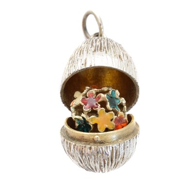 Lot 62 - A silver and enamel egg pendant by Stuart Devlin