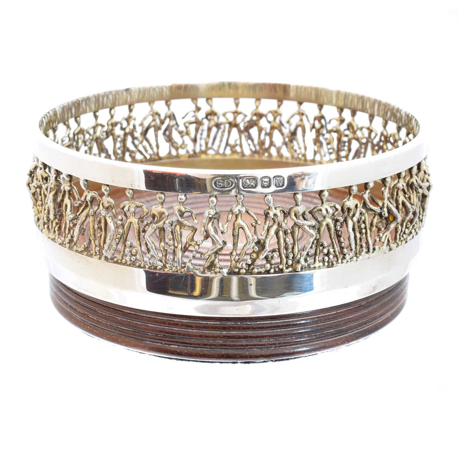 Lot 42 - A 'cariatic' silver wine coaster by Stuart Devlin