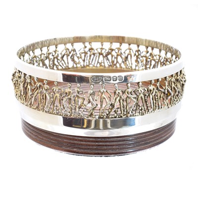 Lot 42 - A 'cariatic' silver wine coaster by Stuart Devlin
