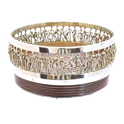 Lot 42 - A 'cariatic' silver wine coaster by Stuart Devlin