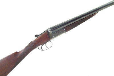 Lot 106 - F. J. Wiseman 12 bore double barrel shotgun 87044 with case.
