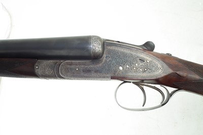 Lot 107 - William Evan 12 bore side by side shot gun 11178 with case