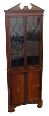 Lot 210 - Edwardian mahogany floor standing double corner cupboard
