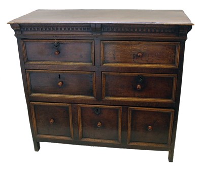 Lot 399 - 18th century oak chest of four short and one long drawer.