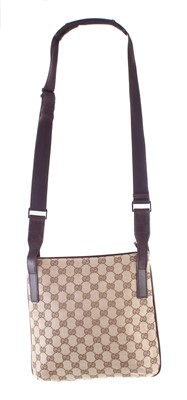 Lot 38 - A Gucci monogram canvas Messenger Crossbody shoulder bag