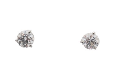 Lot 41 - A pair of brilliant-cut diamond stud earrings