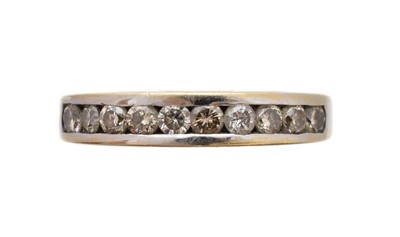 Lot 232 - A diamond half eternity ring