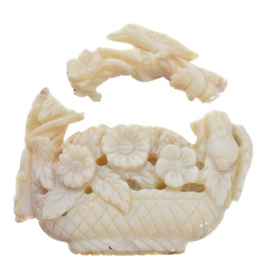 Lot 247 - An opal carving