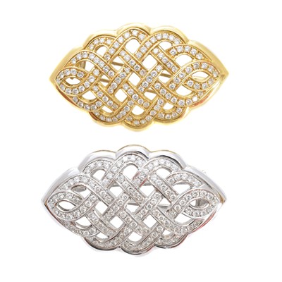 Lot 26 - A pair of diamond brooches