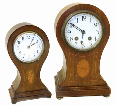Lot 133 - Edwardian mahogany balloon case clock.