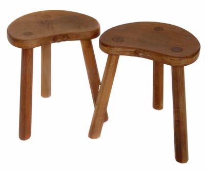 Lot 146 - Two Robert "Mouseman" Thompson oak kidney shaped cow stools.