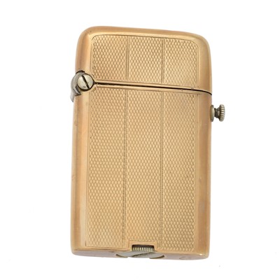 Lot 108 - A yellow metal lighter by Thorens