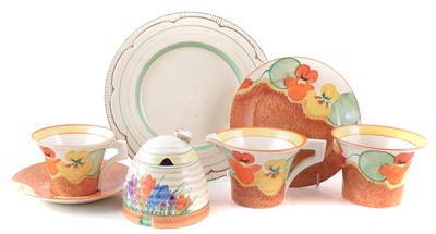 Lot 98 - Clarice Cliff preserve, tea for one and a plate