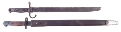 Lot 231 - Japanese Type 30 Arisaka Bayonet and scabbard and a 1907 SMLE bayonet and scabbard.