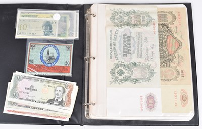 Lot 31 - One album of assorted world banknotes.