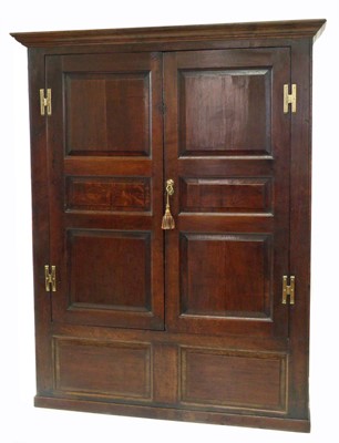 Lot 384 - Early 18th-century oak floor standing livery or coachman's cupboard