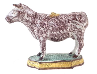 Lot 243 - Pearlware cow creamer.