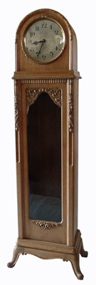 Lot 239 - 1930's light oak longcase clock