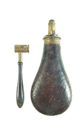 Lot 212 - Dixon and Sons powder flask and a measure