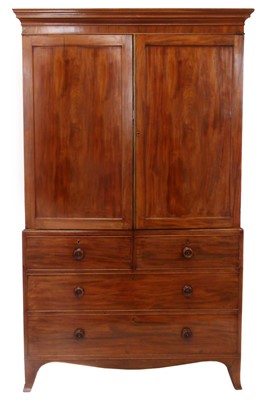 Lot 377 - Early 19th century mahogany linen press