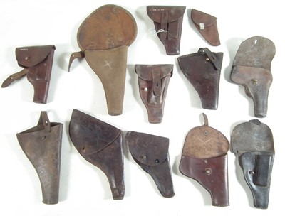 Lot 267 - Twelve various leather pistol holsters