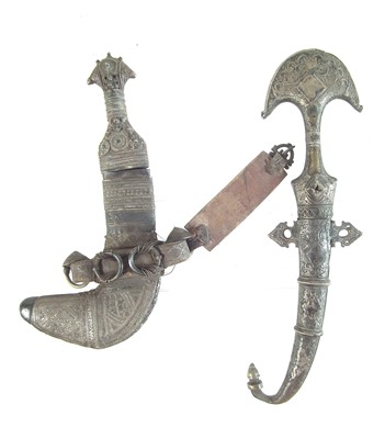 Lot 408 - Two white metal mounted Jambiya