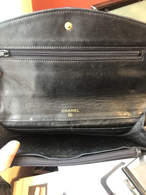 Lot 103 - A Chanel Flap Logo Bifold Long Wallet