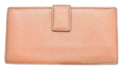 Lot 27 - A Gucci logo trifold long wallet