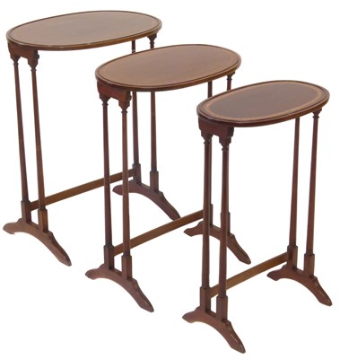 Lot 403 - Edwardian mahogany nest of three tables