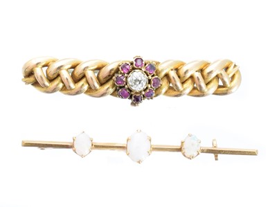 Lot 38 - Two gem-set brooches